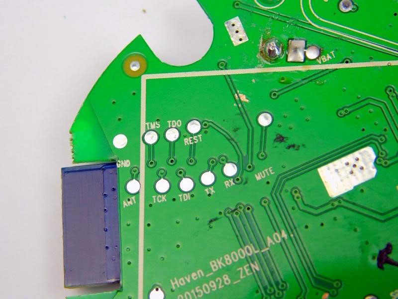 The labelled pads under the main microcontroller